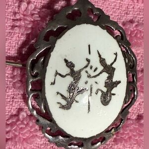 Sterling white enameled piece made in Siam